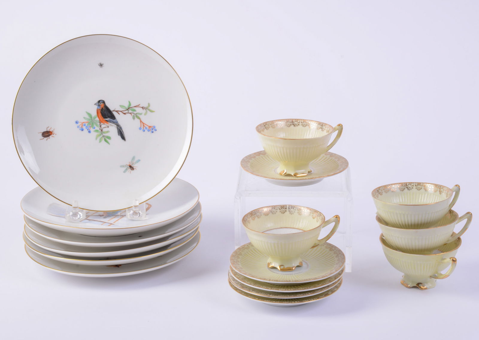Six Chinese Bird Decorated Small Plates.: With five demitasse yellow cups and saucers. Plate diameter 6.75 inches. Good condition.