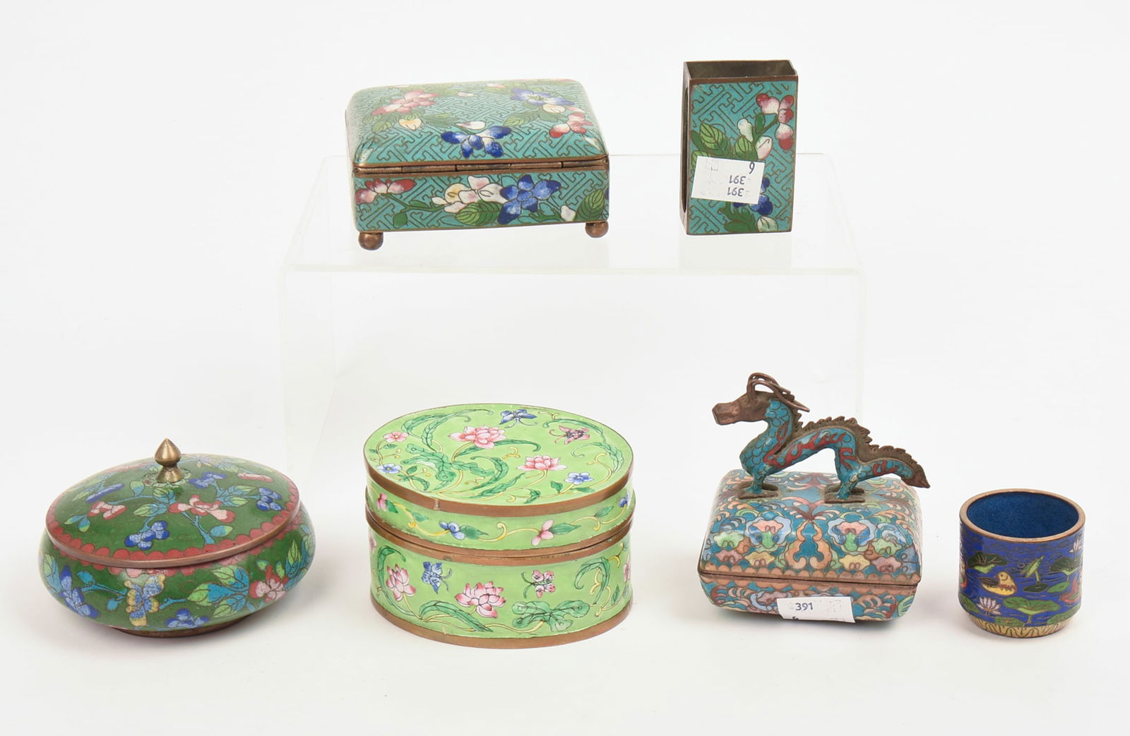 Four Enamel Covered Boxes. - 2