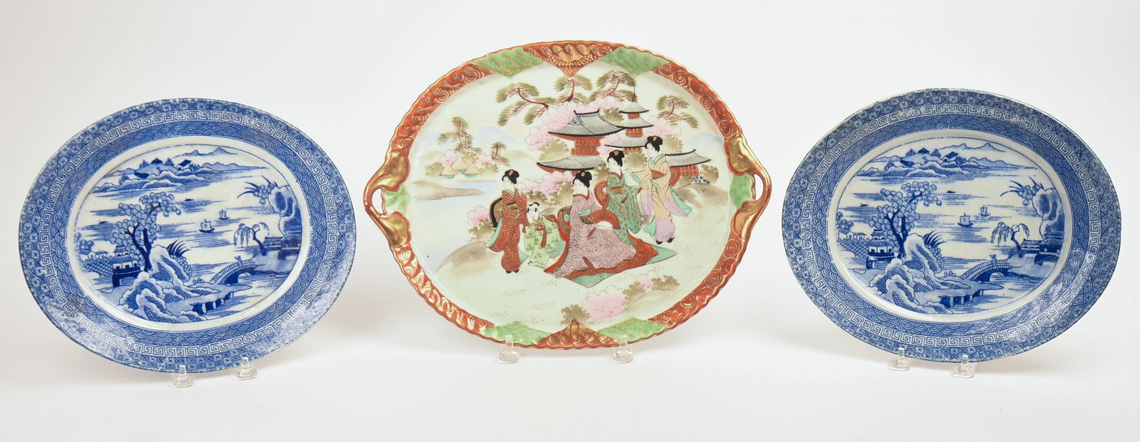 Pair of Chinese Blue and White Serving Plates.: With polychrome decorated tray. Width of plates 12 inches. Good condition.