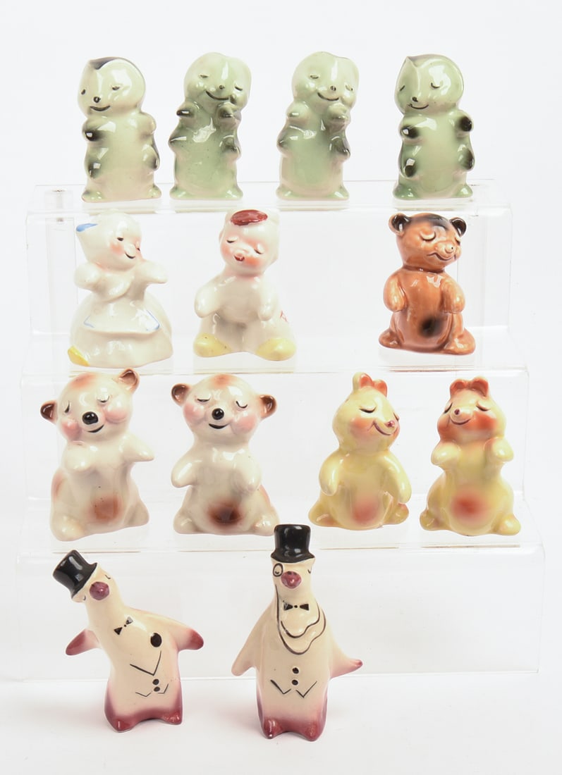 Thirteen Salt and Pepper Shakers.: Height of tallest 4 inches.