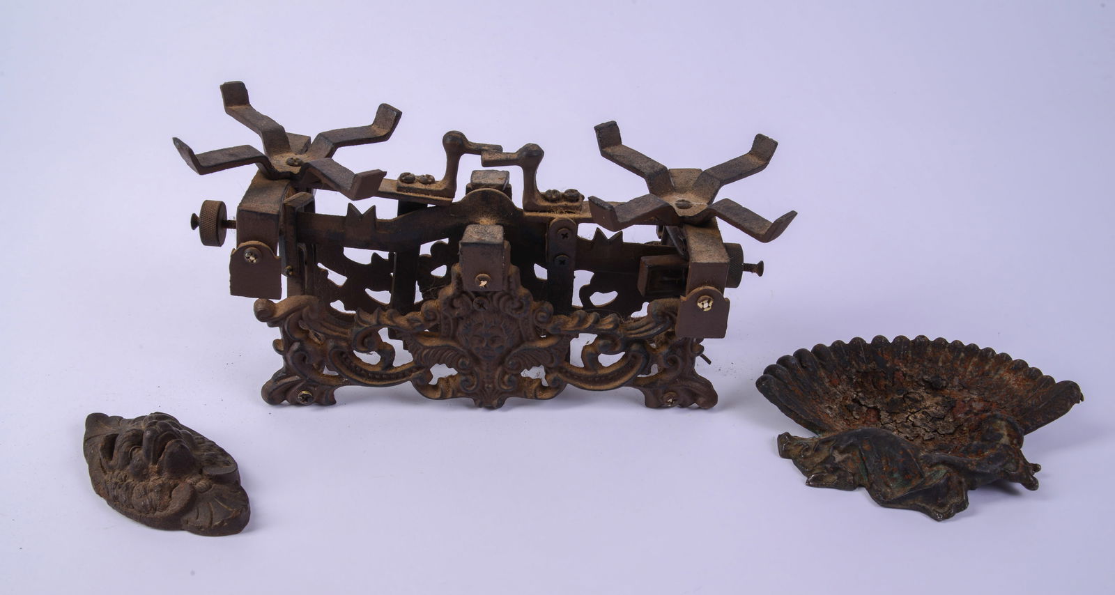 Three Cast Iron Items.