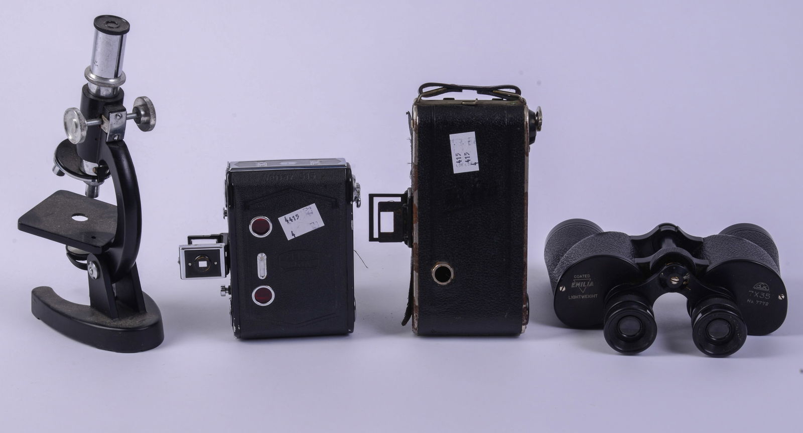 Two Cameras, Binoculars, and a Microscope. - 2