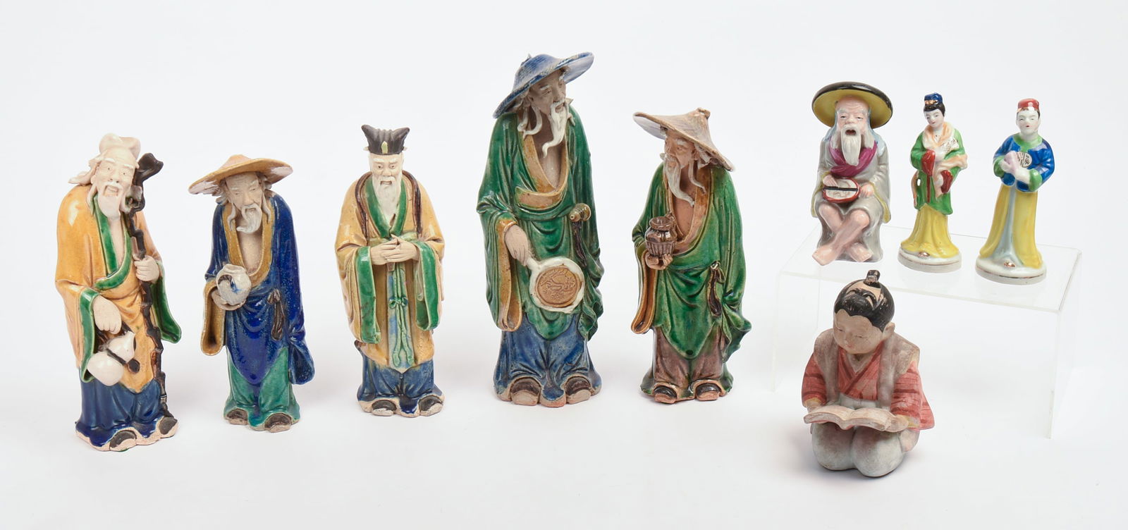Nine Chinese Porcelain Figures.: Height of tallest 12 inches.