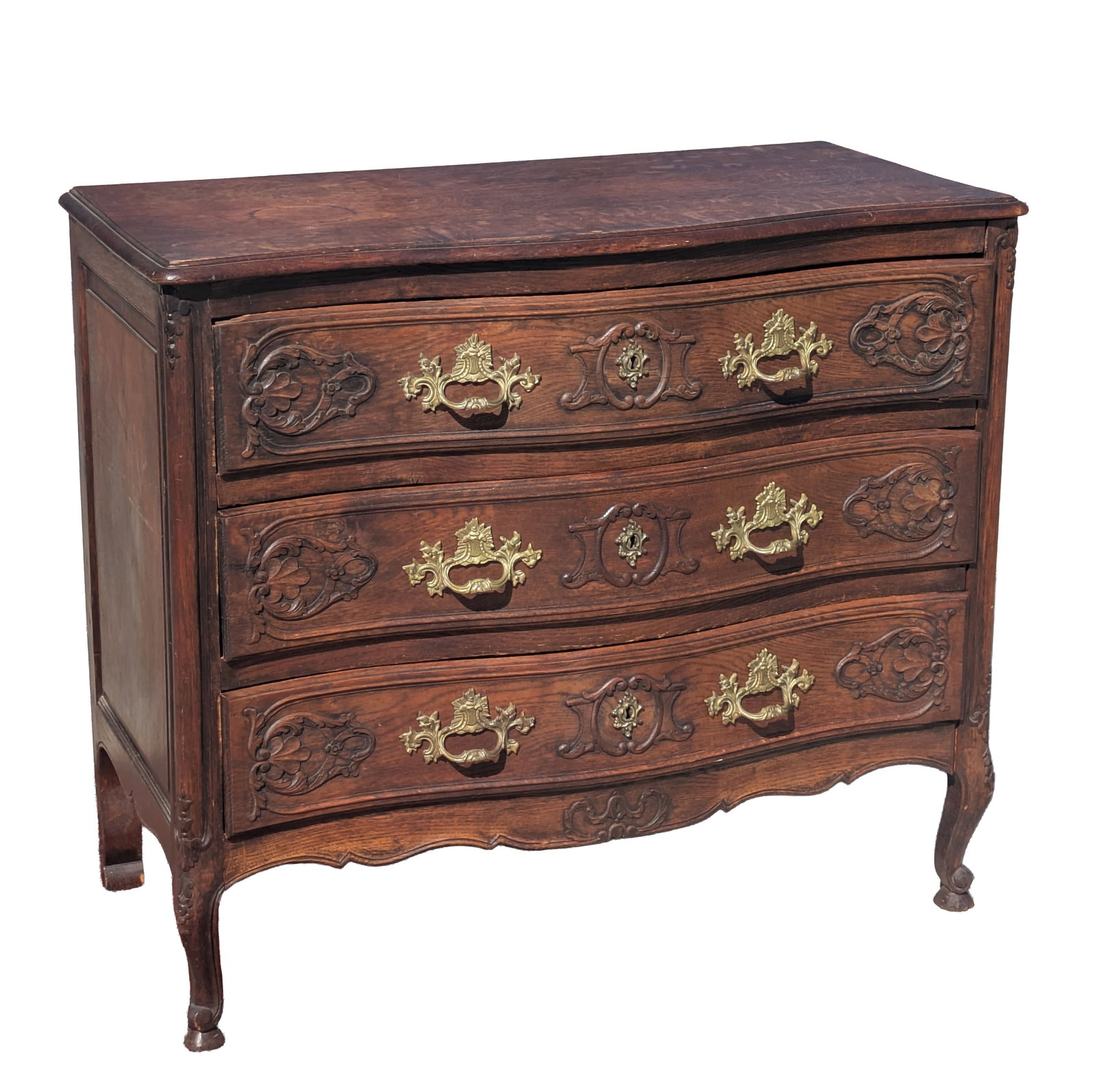 19th C Oak French Chest: Having three carved Serpentine Drawers. H 34, W 38 3/4, D 20