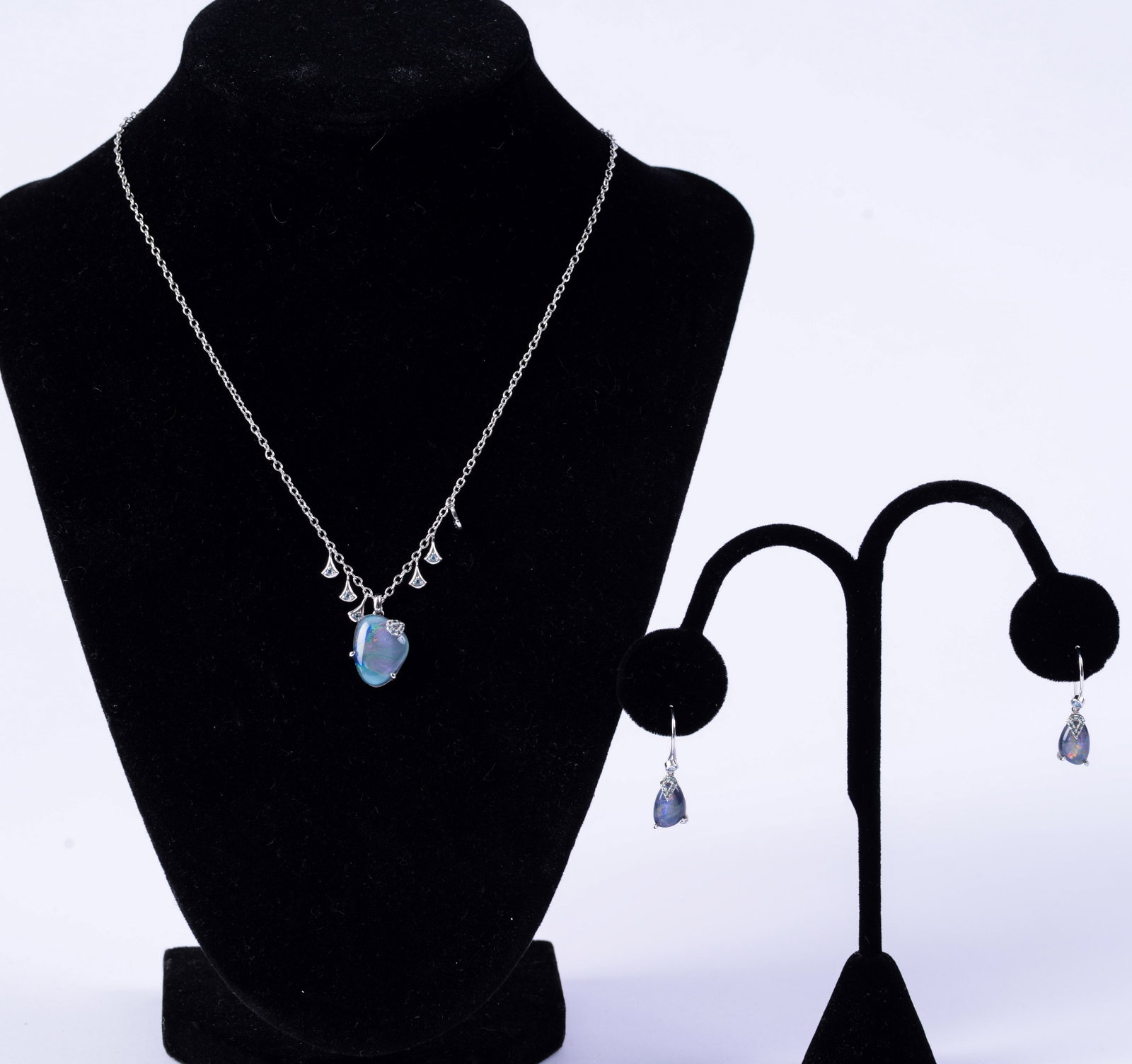 Jan Leslie Necklace and Earrings.: Possibly opal. Necklace chain marked 925. Length of necklace 8 inches.