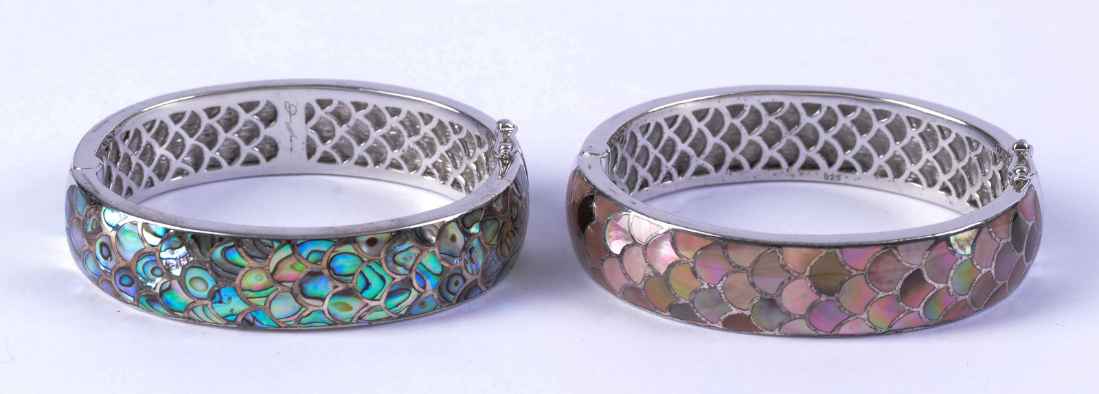 Two Jan Leslie Sterling Bracelets with Scale Design.: Possibly mother of pearl and abalone inlays. Width of bracelet 2.5 inches.