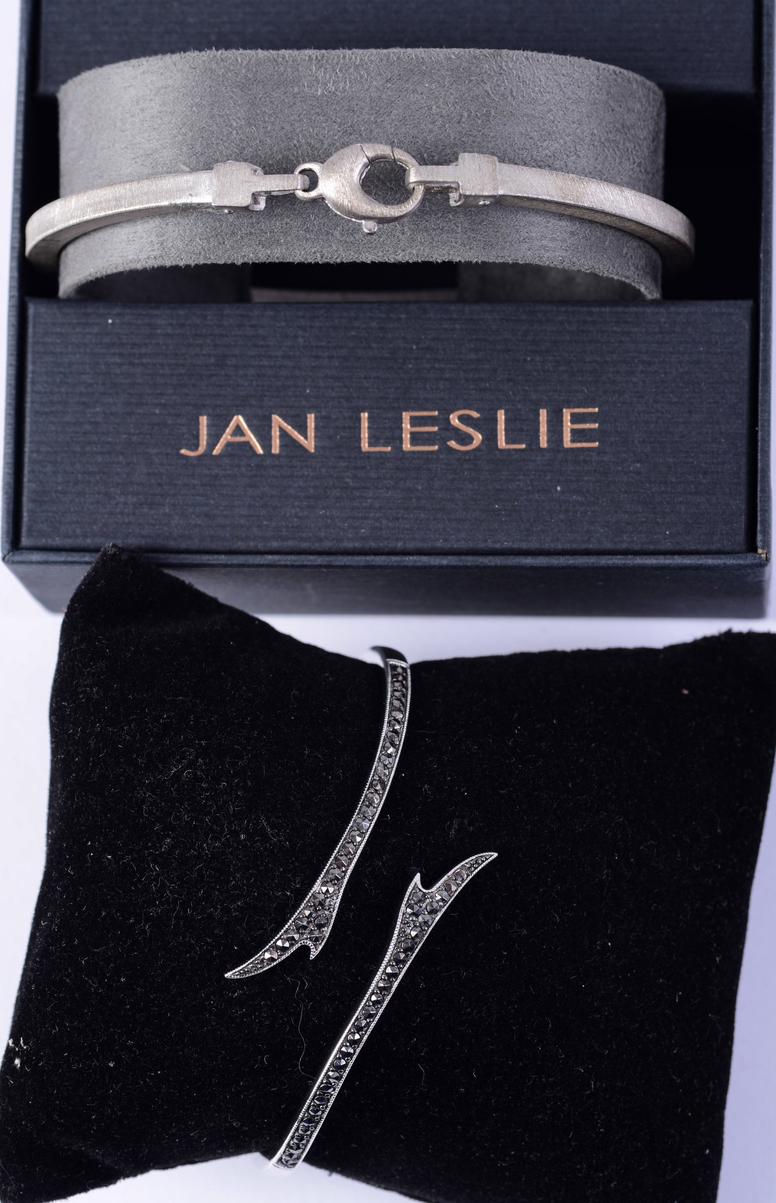 Two Jan Leslie Sterling Bracelets.: One with rhinestones, width 2.25 inches. Both hinged.