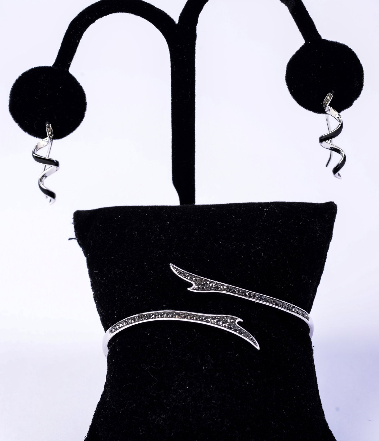 Jan Leslie Sterling Bracelet with Rhinestones and Reef Ribbon Earrings.: Width of bracelet 2.25 inches.