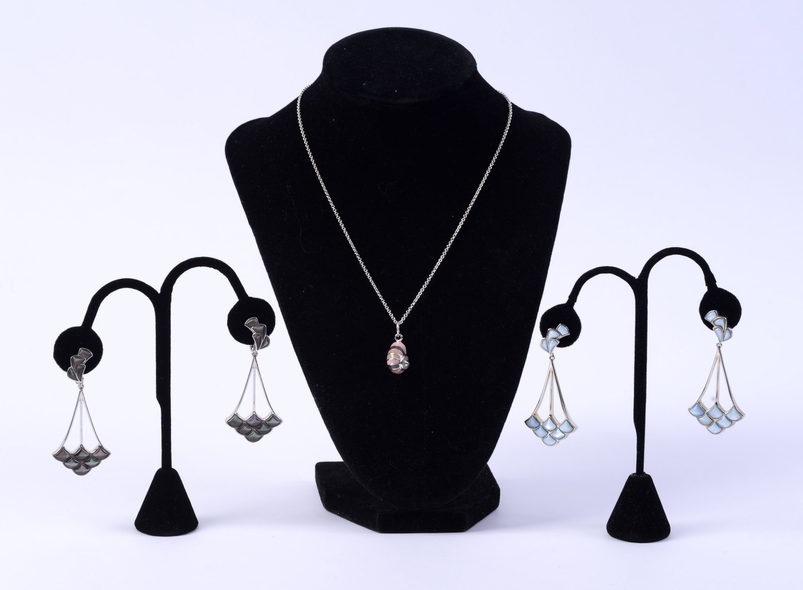 Two Pairs Jan Leslie Opalescent Earrings.: With a snail shell sterling necklace. Length of necklace 8 inches. Height of earrings 2.5 inches.