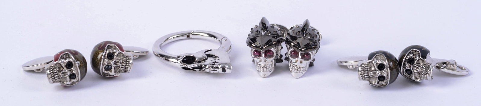 Three Pairs Jan Leslie Sterling Skull Themed Cufflinks.: Together with Jan Leslie sterling skull keychain.