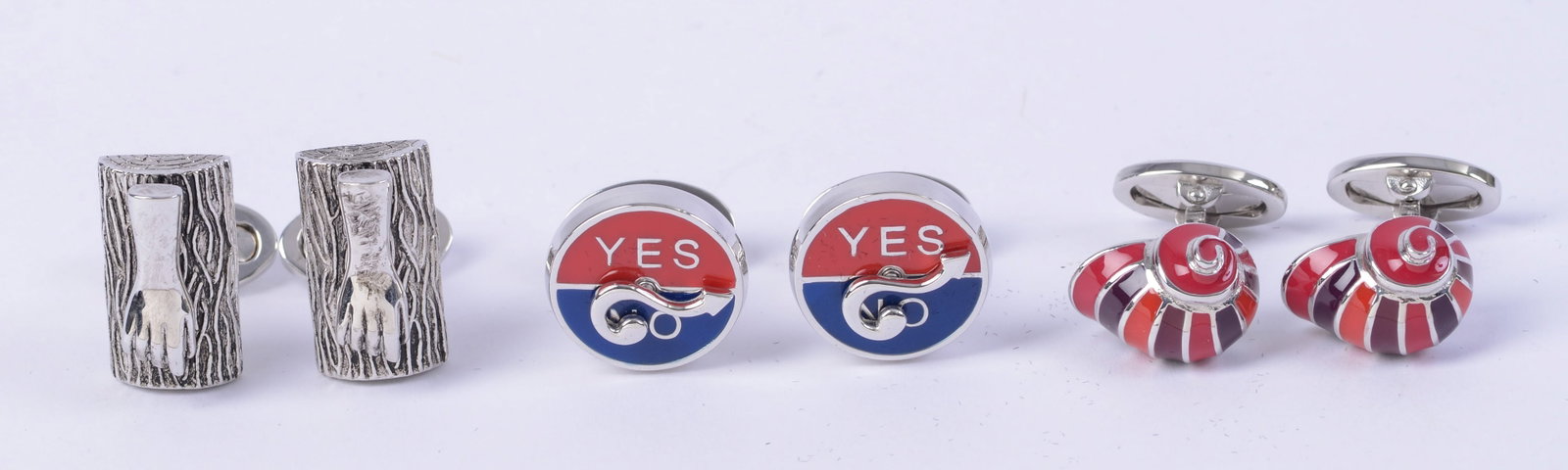 Three Pairs Sterling Jan Leslie Cufflinks.: Knock on wood design, snail shells, and yes/no with spinning question mark.