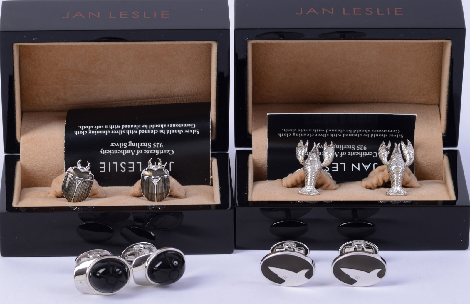 Four Pairs Jan Leslie Sterling Cufflinks.: Designs include baseball cap, lobster, beatle, and shark.
