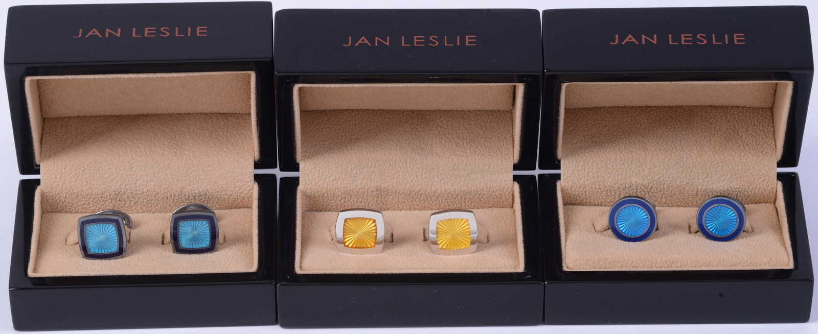 Three Pairs Jan Leslie Sterling Cufflinks.: Two blue, one yellow.