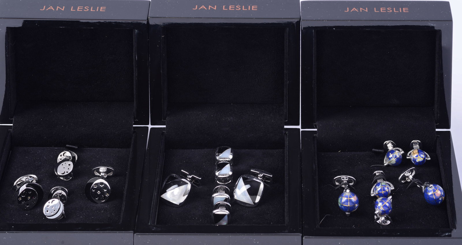 Three Sterling Sets of Jan Leslie Cufflinks.: Black and mother of pearl, moon and stars, and world globes.