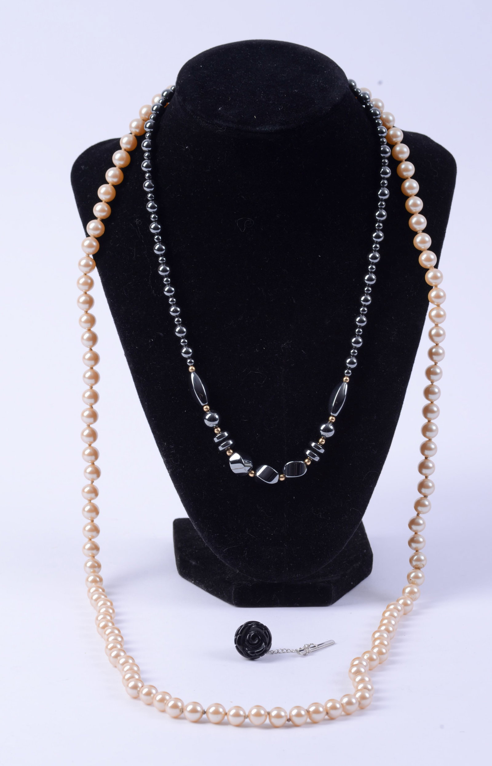 Two Beaded Necklaces and a Tie Pin.: Lengths of necklaces 18 and 33 inches.