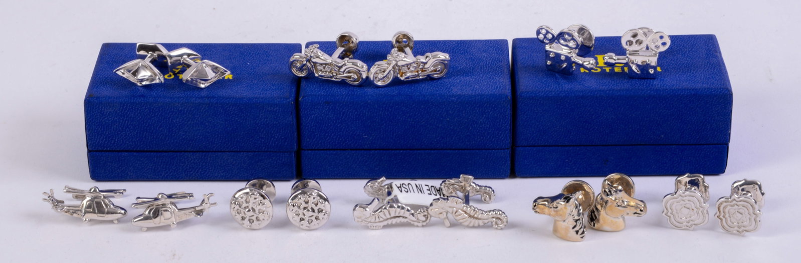 Eight Pairs of Rotenier Sterling Silver Cufflinks.: In original boxes.