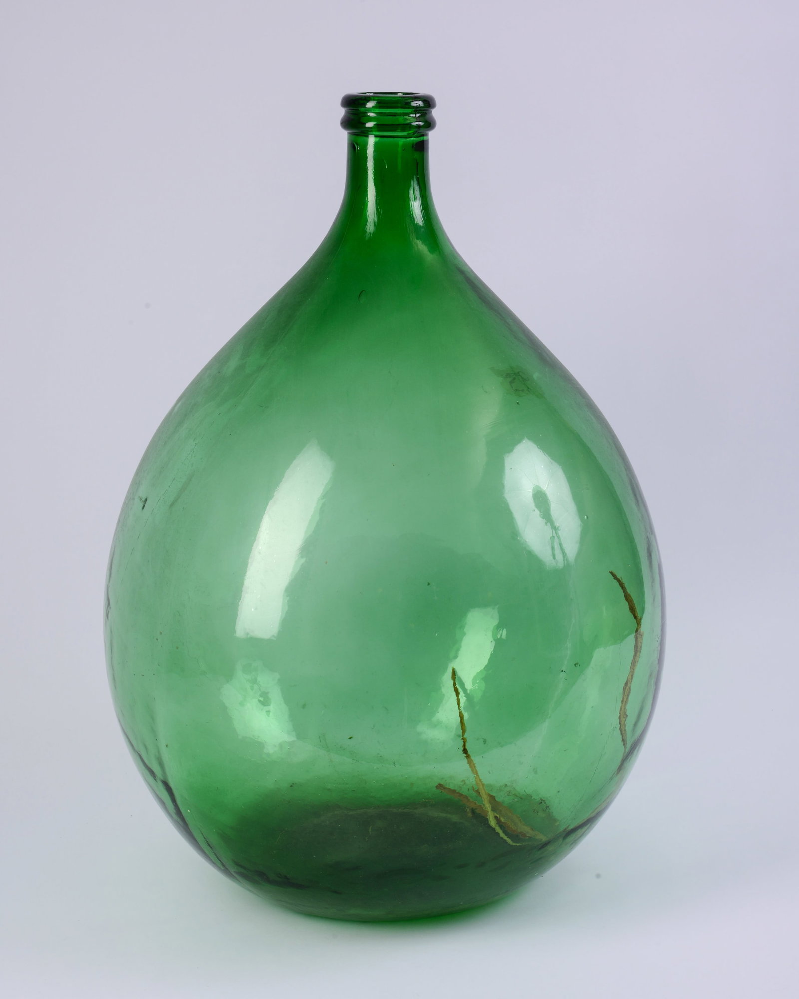 Very Large Green Glass Demijohn Bottle.: Height 26 inches.