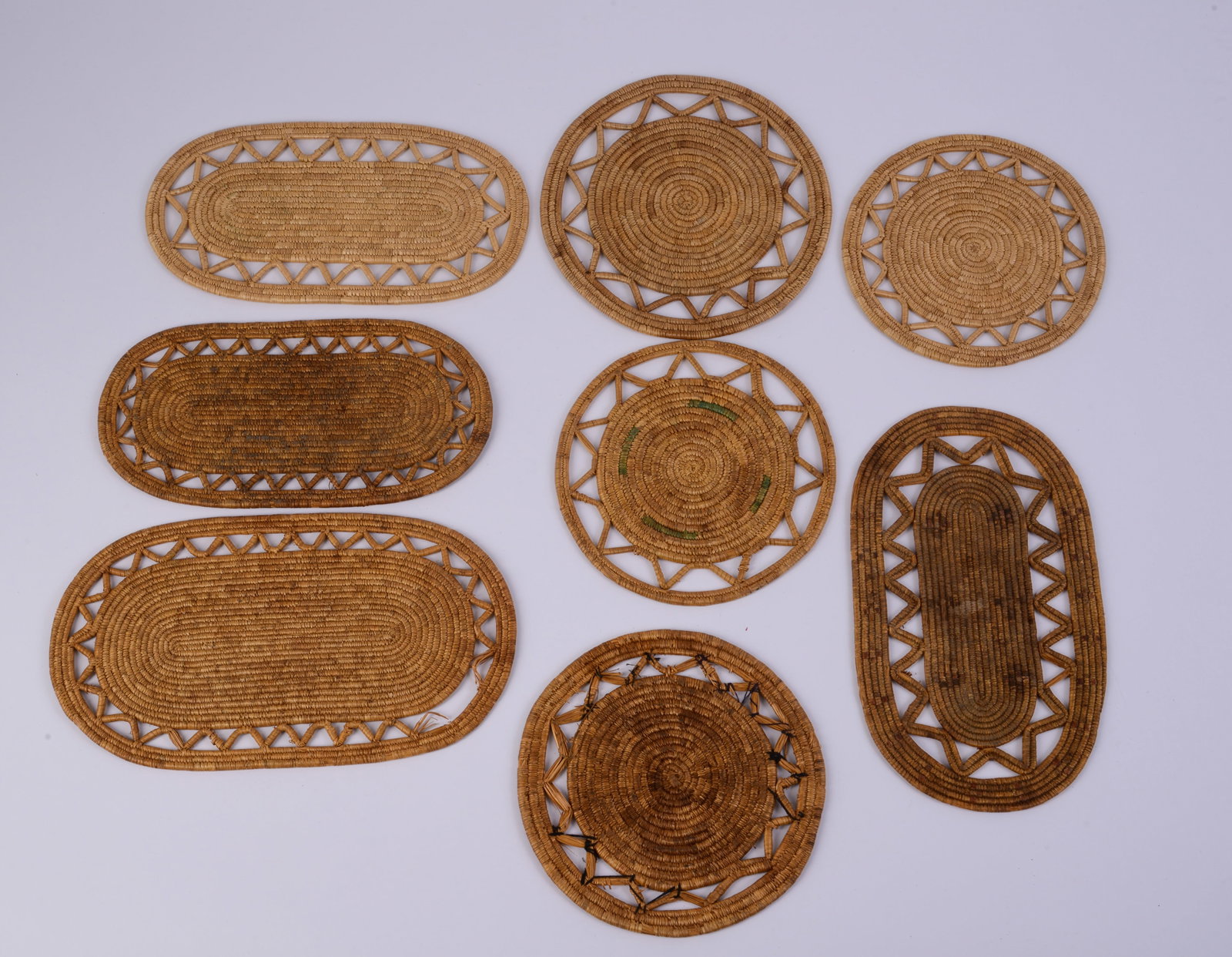 Eight Native American Woven Trivets.: Largest 12 x 6 inches.