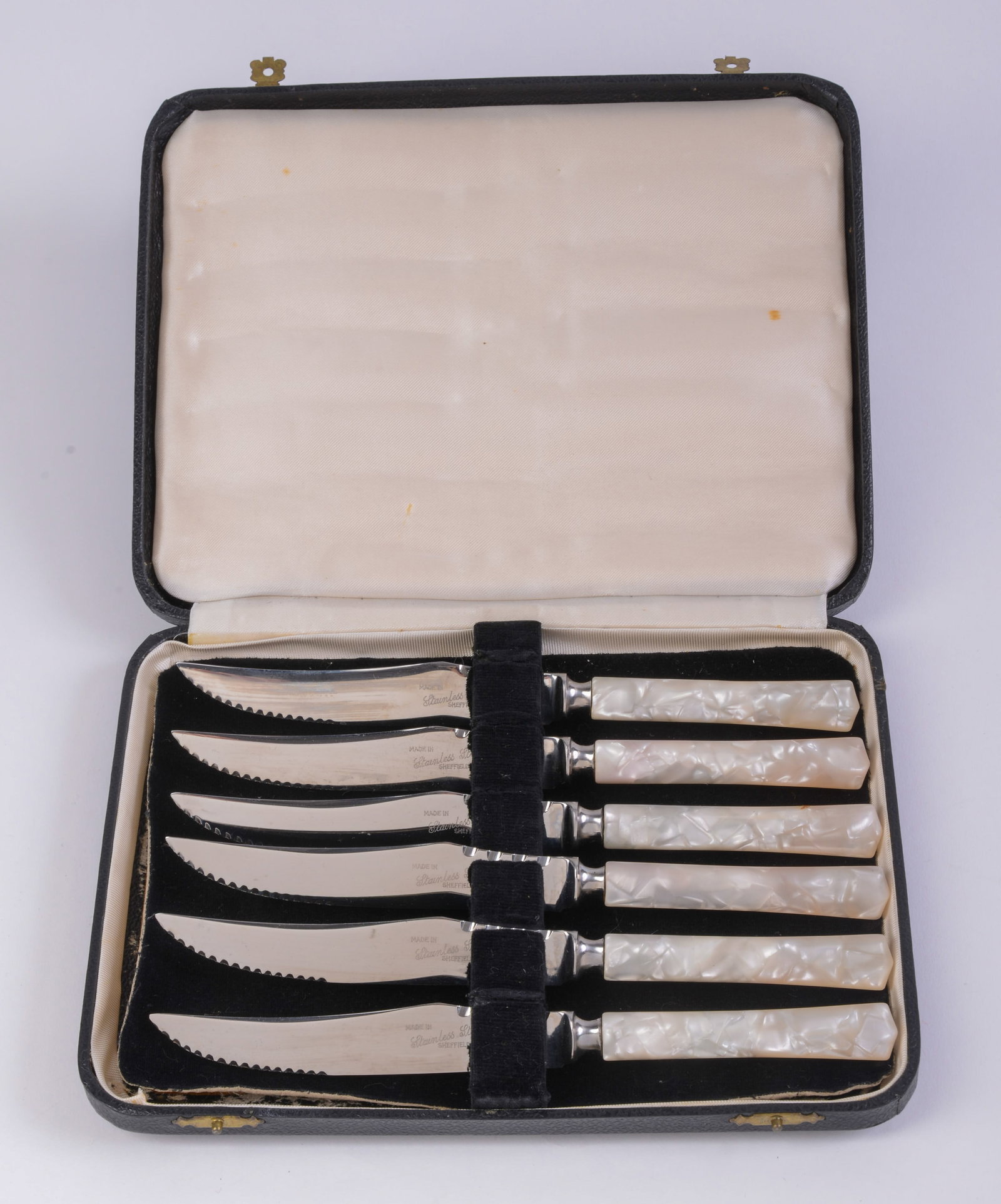 6 Sheffield Stainless Steel Fish Knives with Resin Handles: In original case. Length 8 inches.