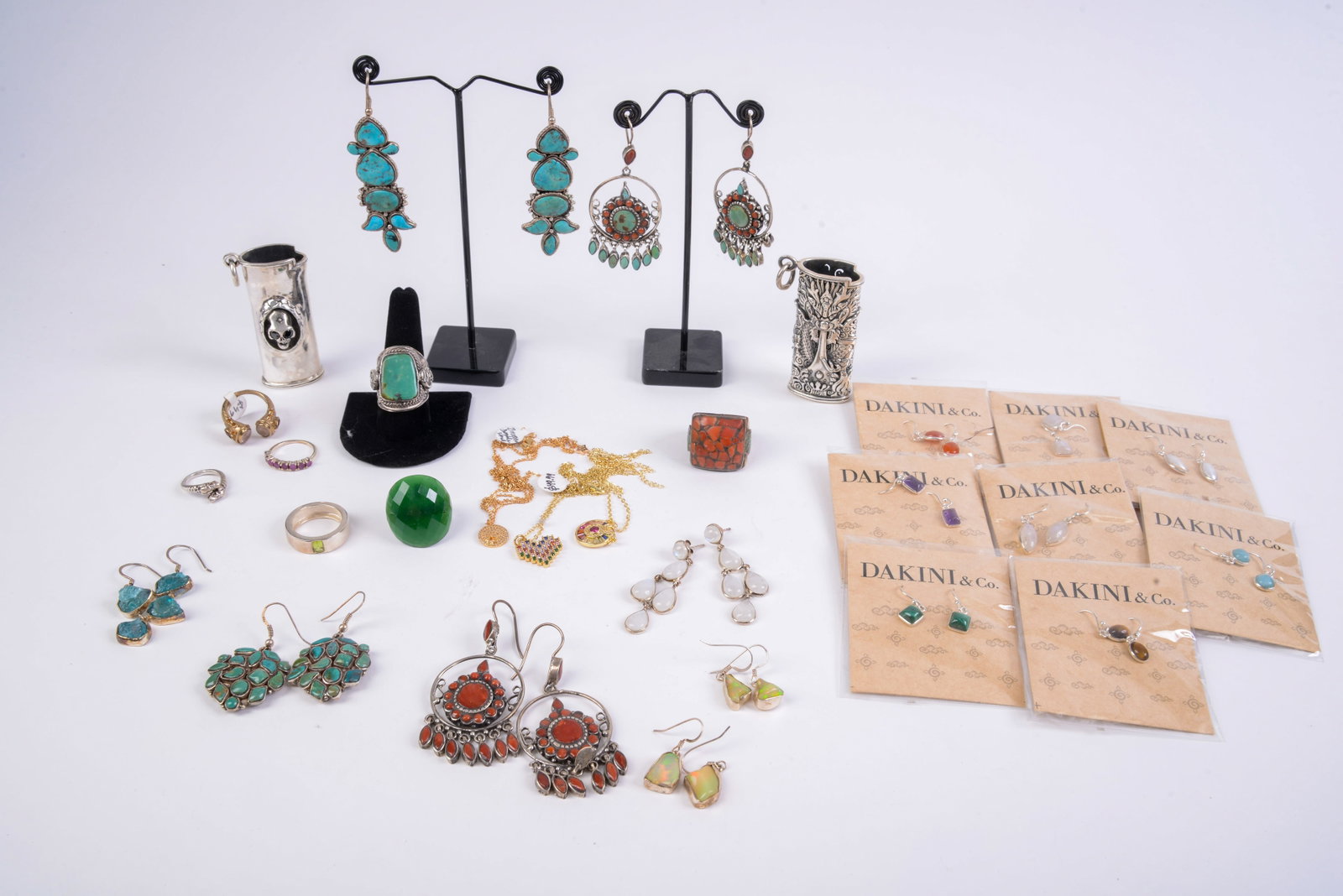 Group of Earrings and Rings.: Some sterling, turquoise and coral. Including stone trinket box and 2 key chains. Longest earring length 3.25 inches.