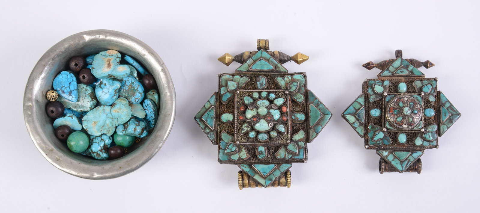 Bowl of Turquoise Loose Stones with 2 Turquoise Pendants.: Largest pendant length 4.5 inches.