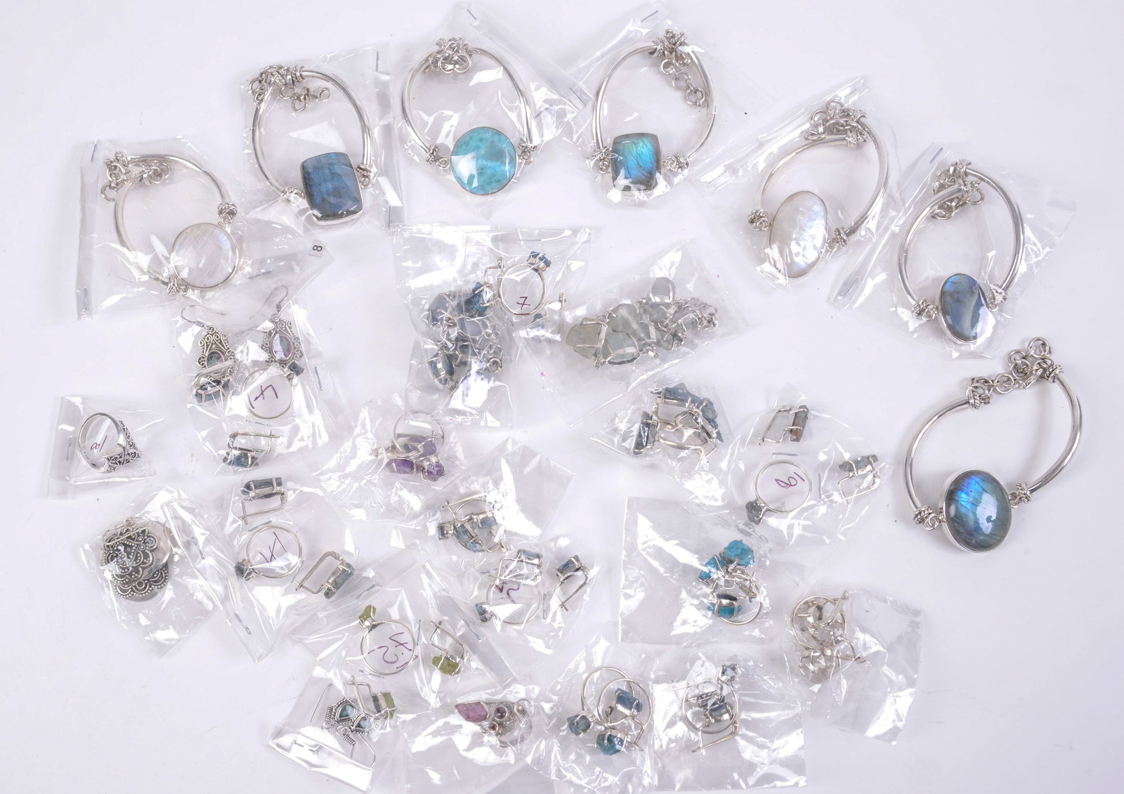 Group of Sterling and Crystal Ring and Earring Sets. (1 of 4)