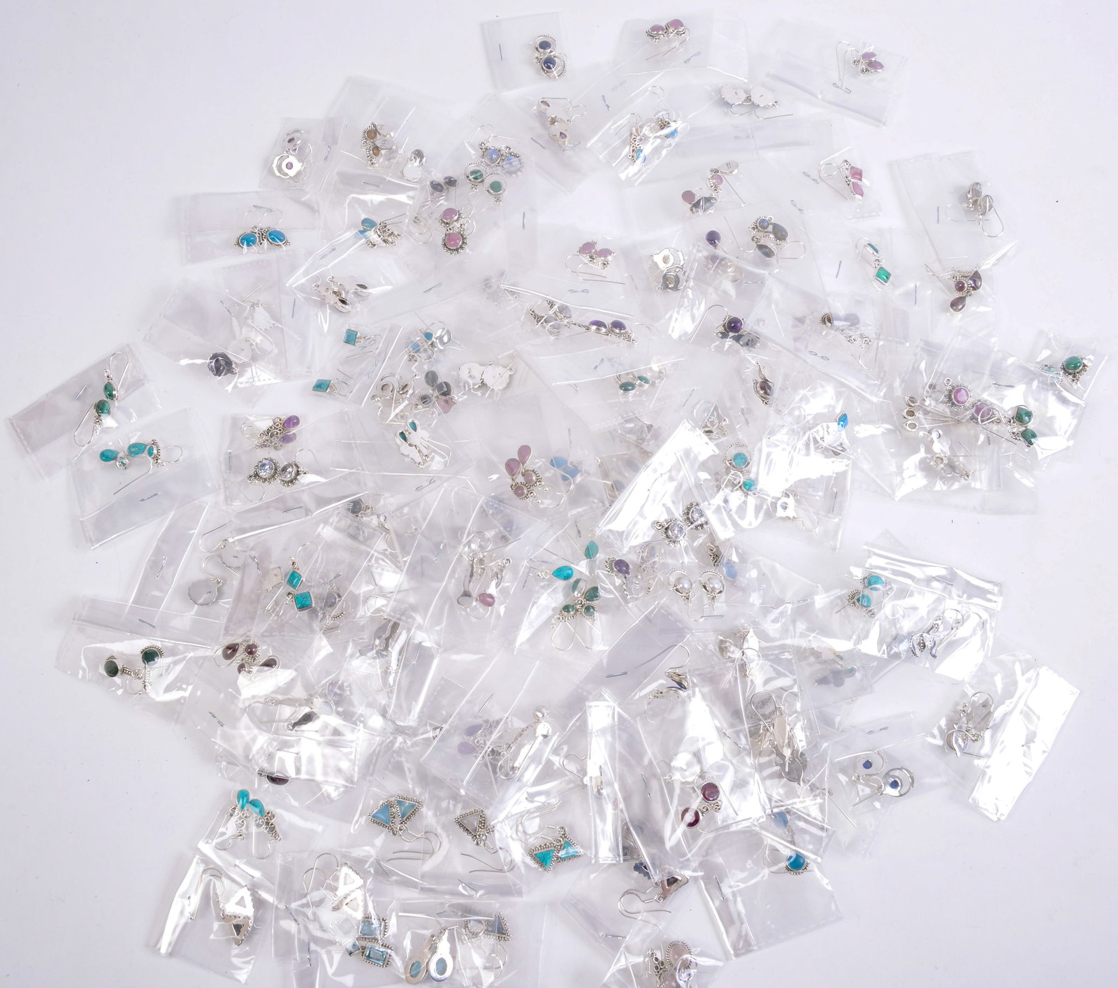 Large Collection of Earrings With Stones.: Mostly sterling. Longest length 1 inch.
