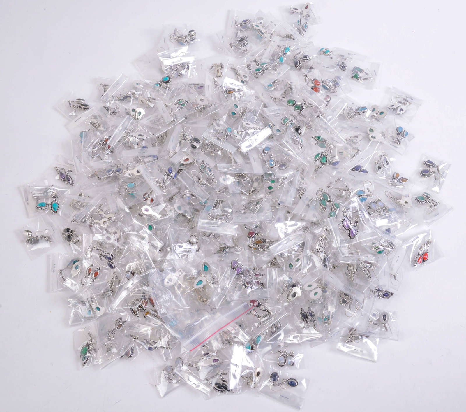 Large Collection of Earrings With Stones.: Longest length 1.5 inches.
