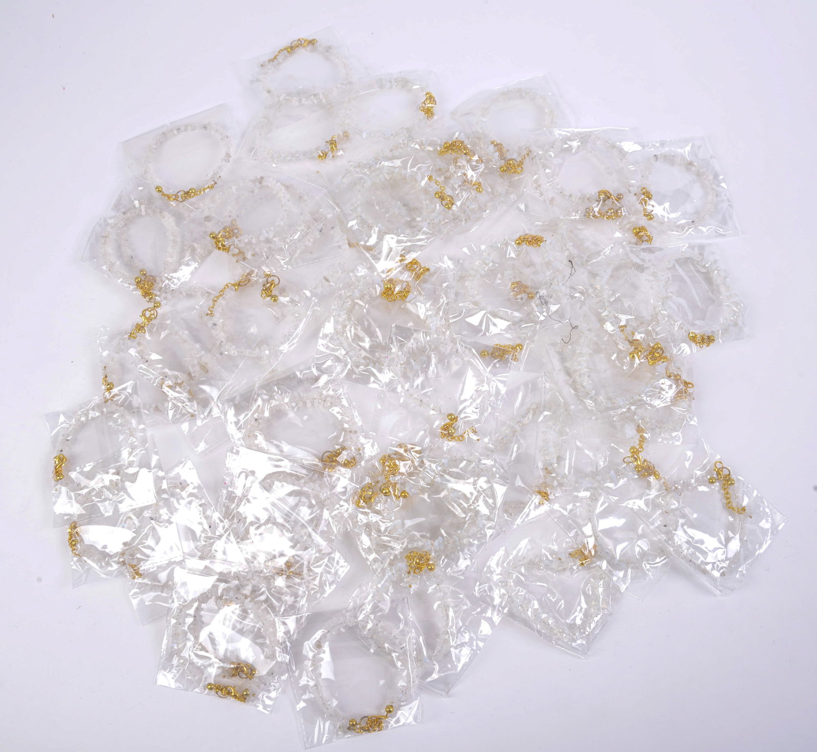 Large Group of White Crystal Bracelets.: Length 7 inches.