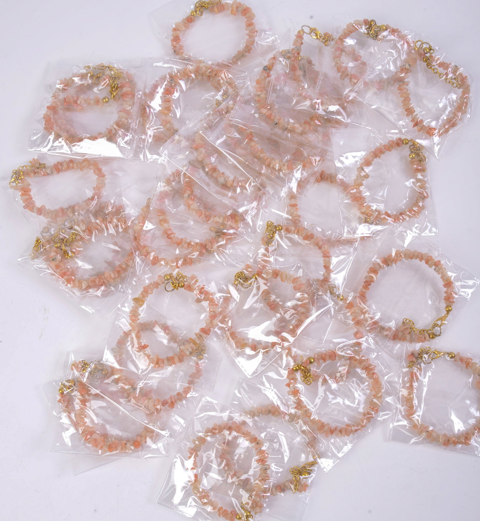 Large Group of Orange and White Crystal Bracelets.: Length 7 inches.