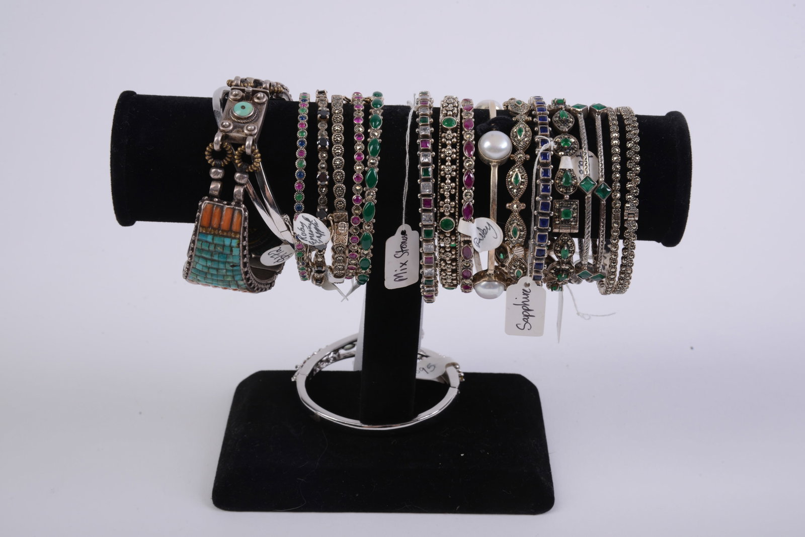20 Costume Jewelry Bracelets.: Includes stand.