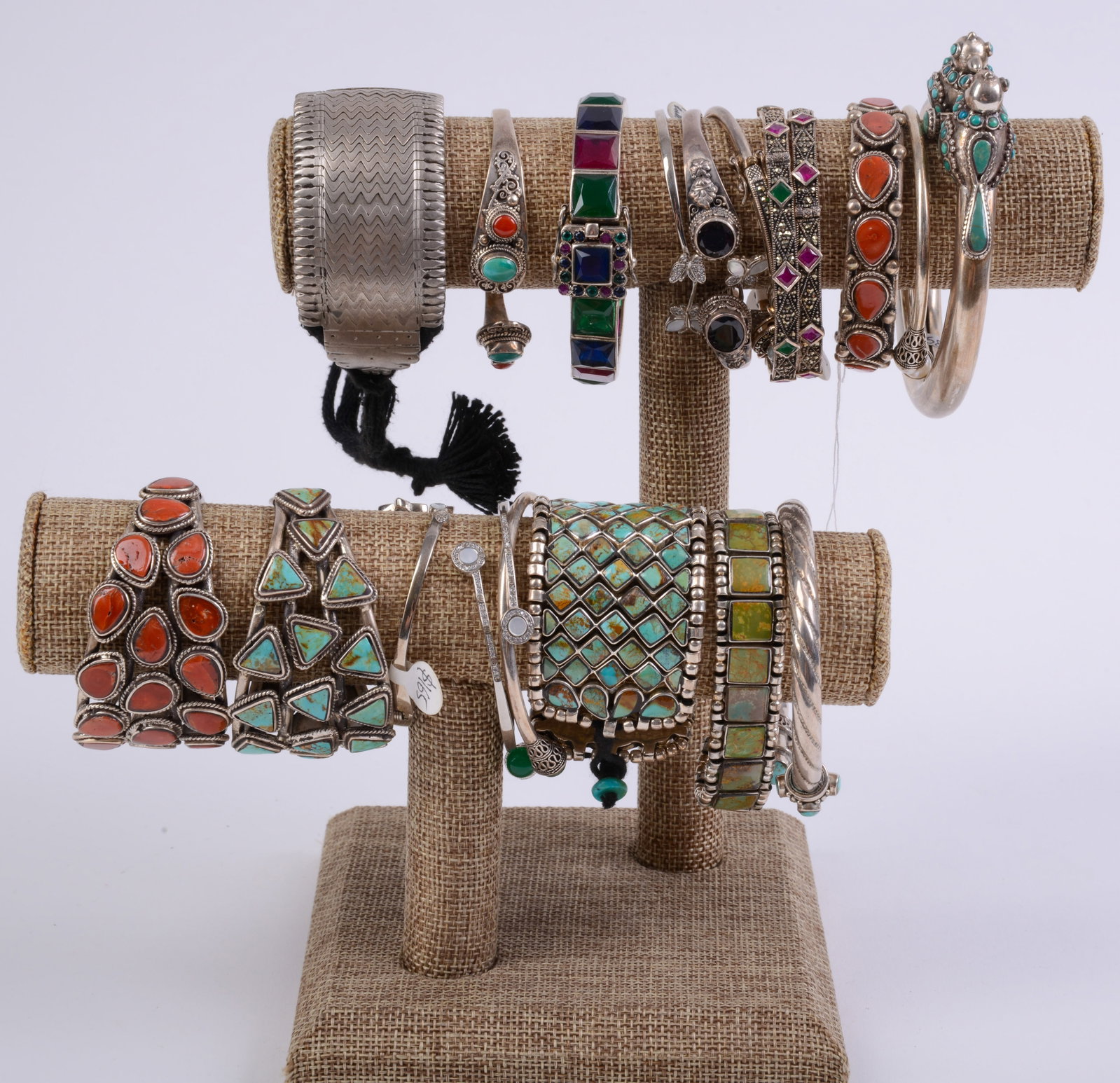 19 Costume Jewelry Bracelets.: Includes stand.