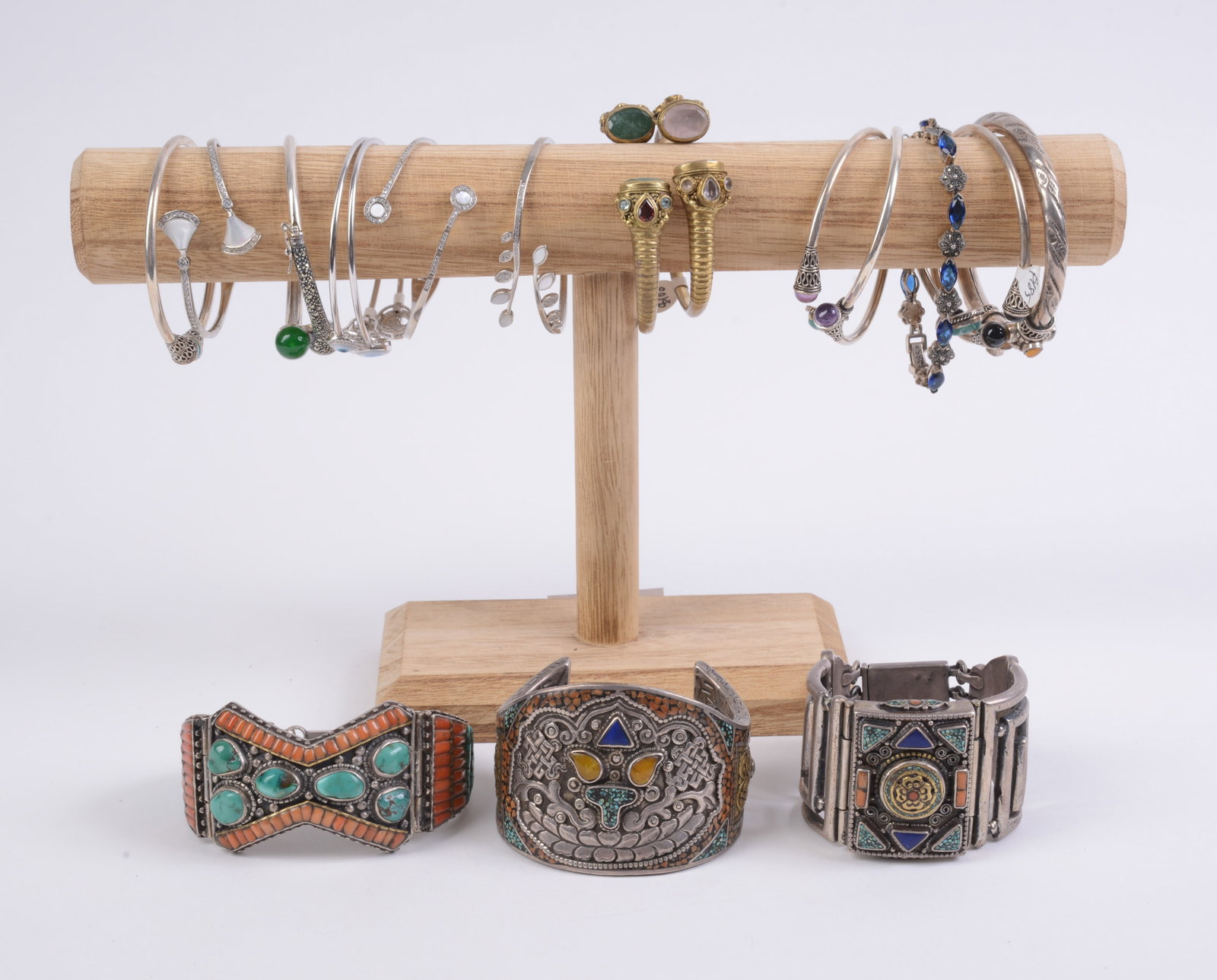 16 Costume Jewelry Bracelets.: Includes stand.