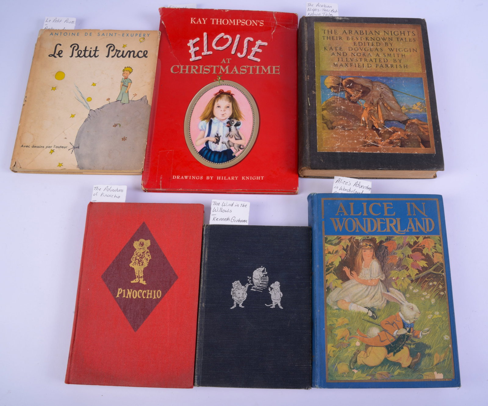 Six Books.: The Wind in the Willows, 1933, The Adventures of Pinocchio, 1959, The Arabian Nights, Alice In Wonderland, 1916, Le Petit Prince, 1943, Eloise at Christmastime, first printing, 1958. Some minor
