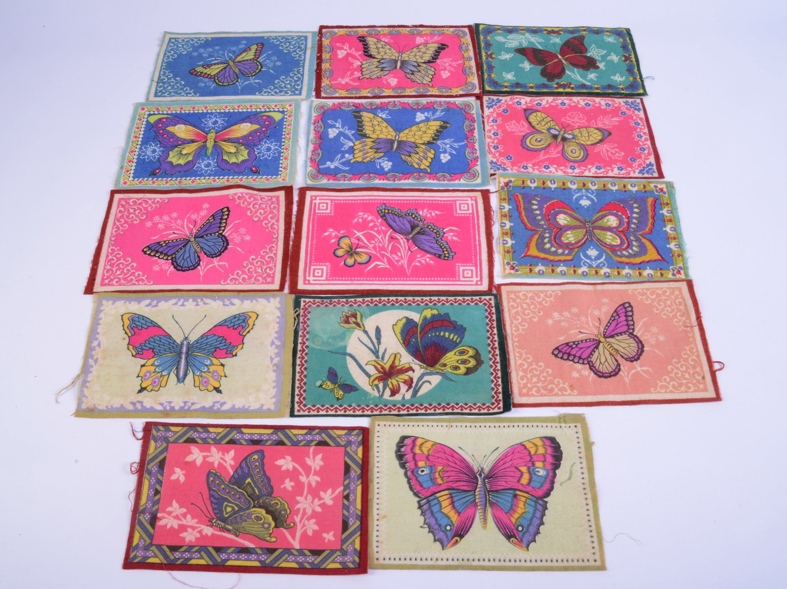 14 Tobacco Flags With Butterflies.: Largest 5.25 x 8.25 inches.