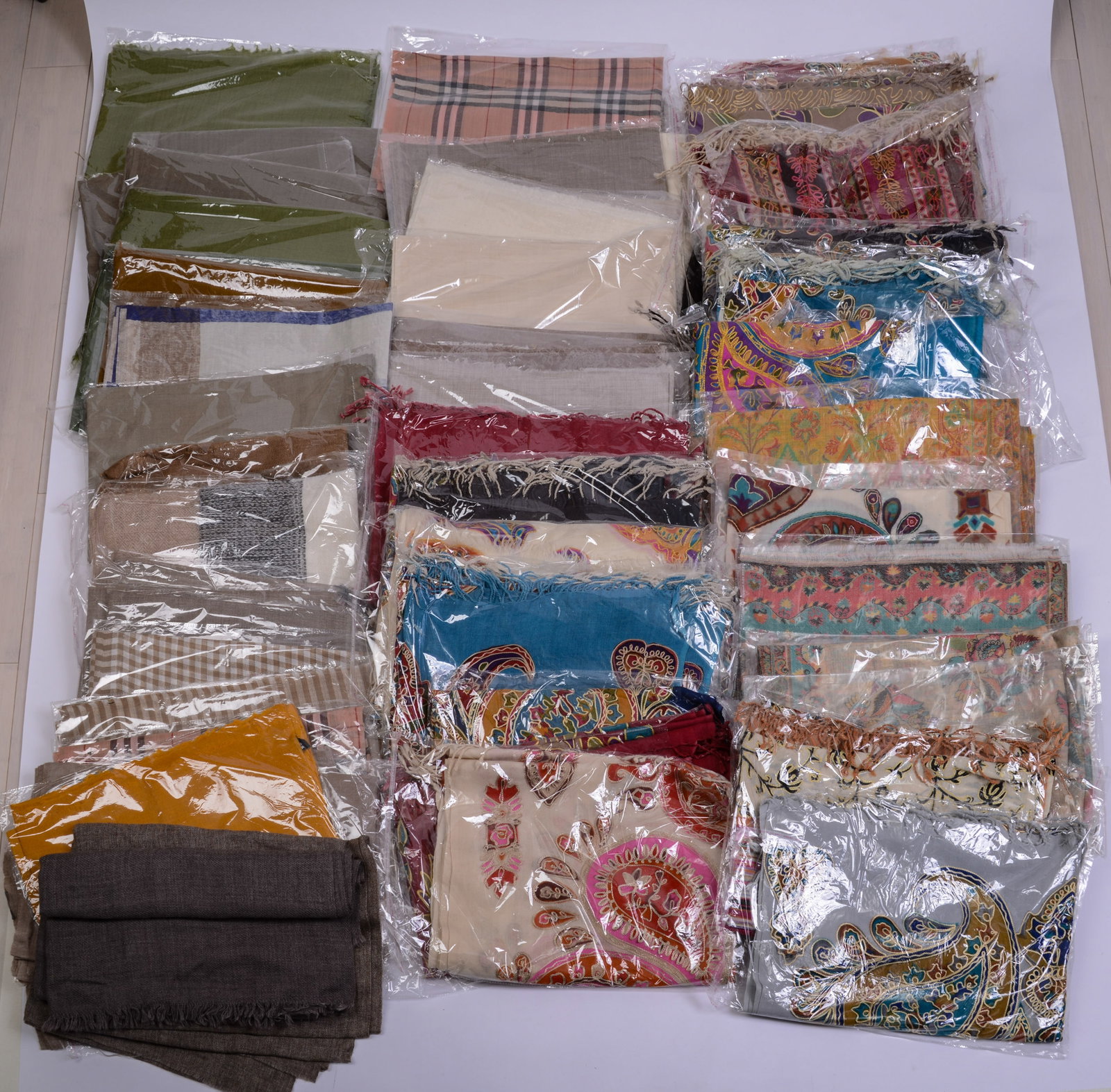 60 Pashmina Shawls.: Brand new, approximately 32 x 42 inches.