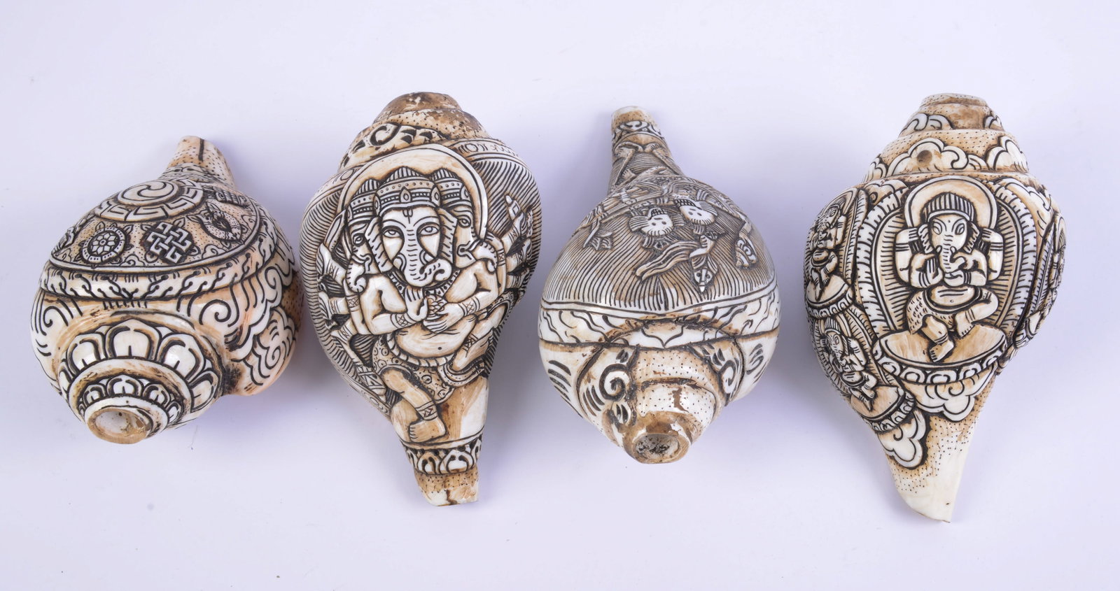 Four Tibetan Carved Conch Shells. - 3