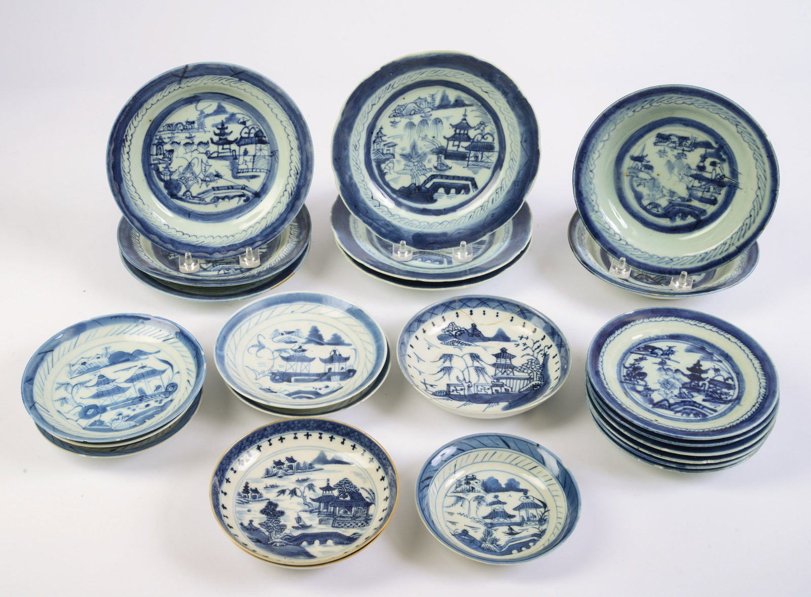 Twenty-three Assorted Canton Smaller Plates.: Diameters 5 to 7 inches. Some chips, an old repair.