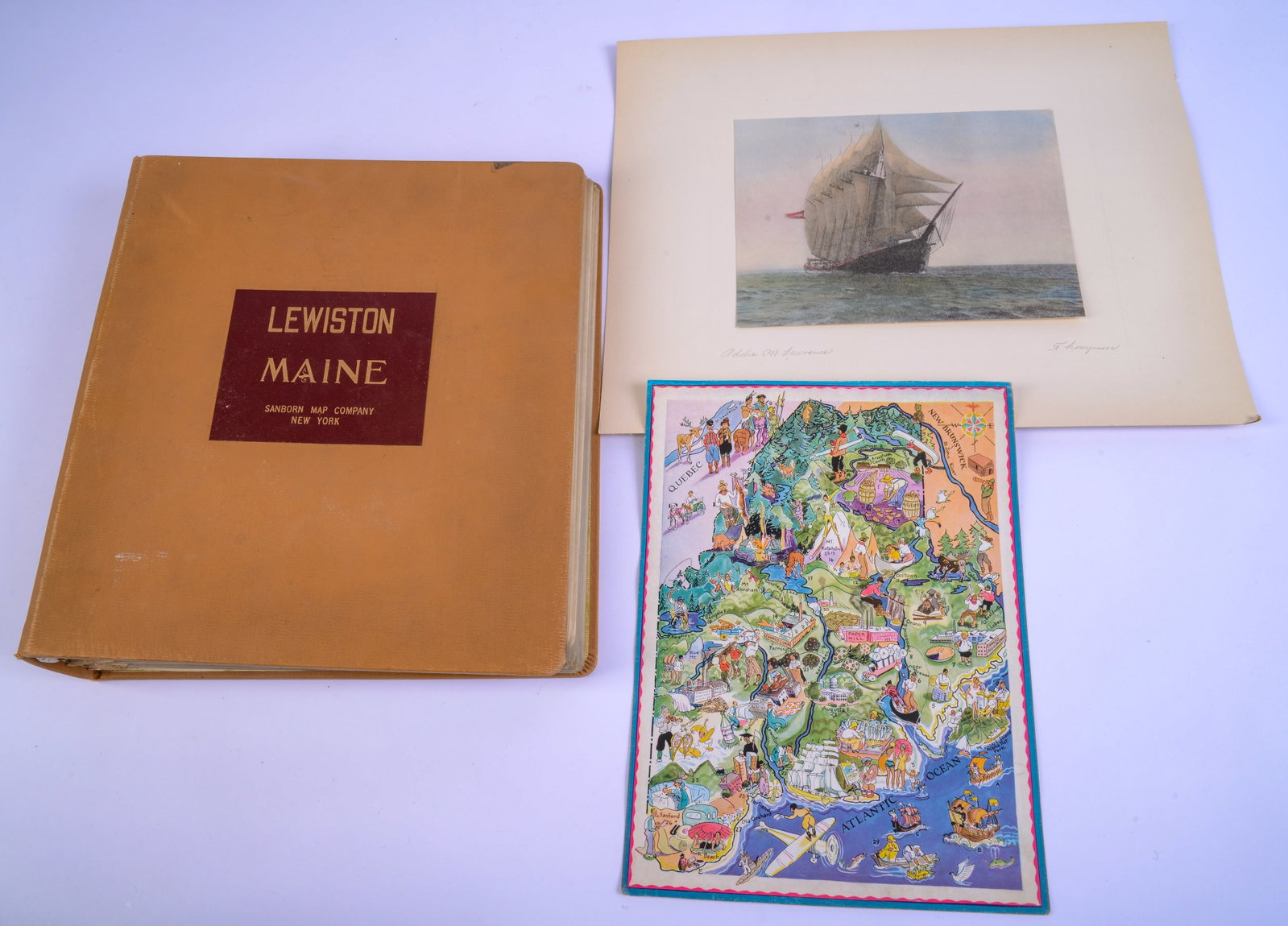 Group of Maine Ephemera: Lewiston Maine, Sanborn Map Company, 1957. Print of a ship, and vintage tourist map of Maine.