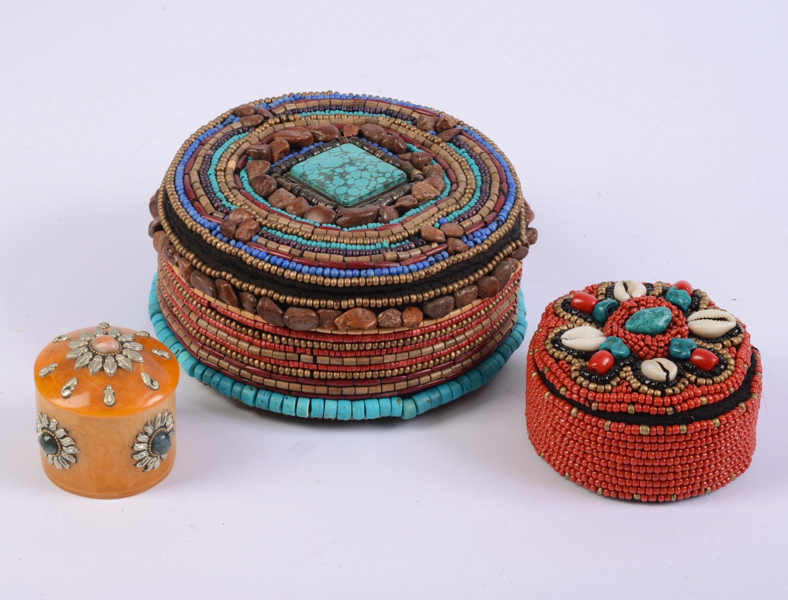 Three Decorative Boxes.: Diameter of largest 7 inches.
