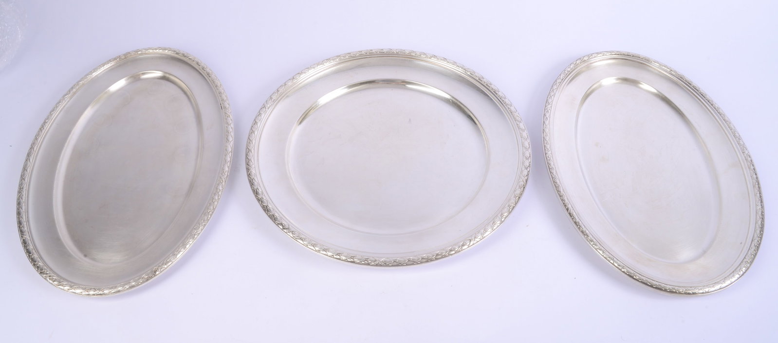 Three Fratelli Broggi Milano Silverplate Trays.: Diameter of largest 15 inches.