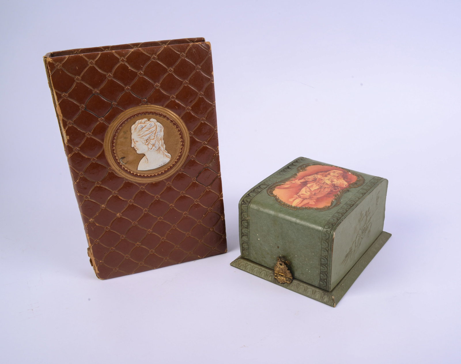 Two European Leather Embossed Boxes.: 4 x 5 x 6 and 1.5 x 6.5 x 11 inches. Book form with damage to binding.