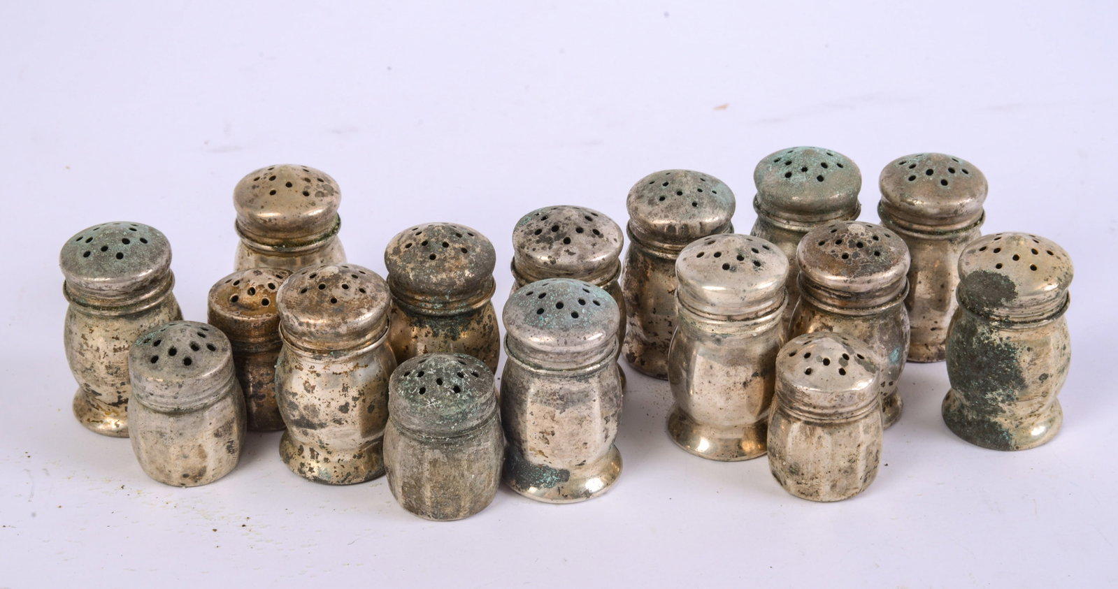 Sixteen Sterling Silver Salt & Pepper Shakers: Marked Sterling on the bottoms - total combined weight 4.819 troy ounces