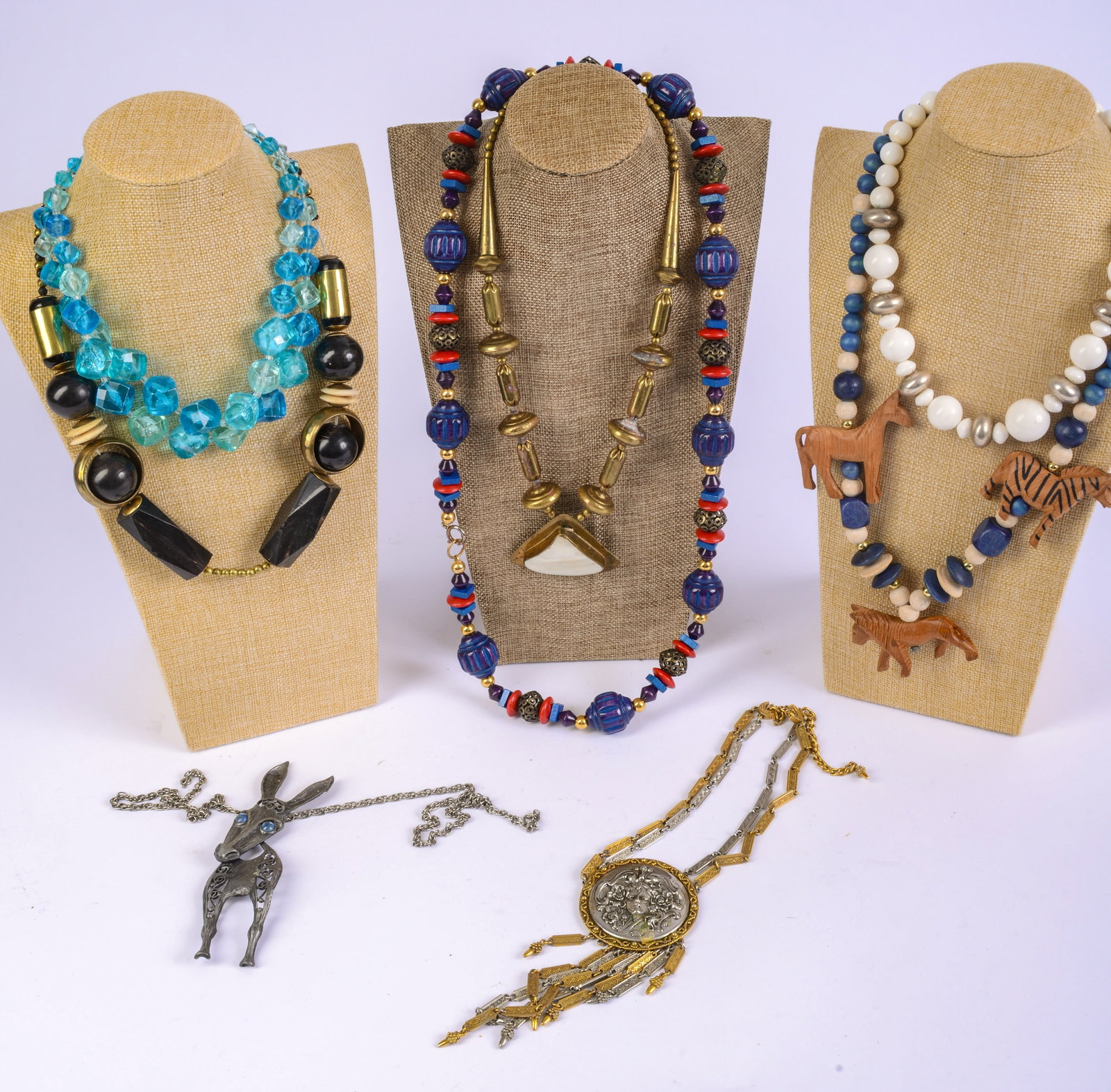Eight Necklaces: Various sizes and materials