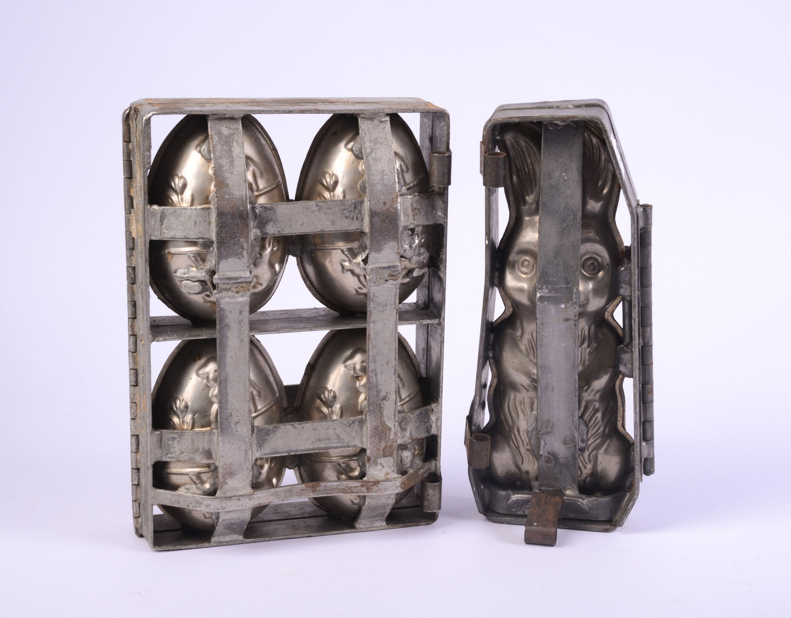 Two Vintage Easter Chocolate Molds.: Rabbit and four eggs, heights 10.5 inches.