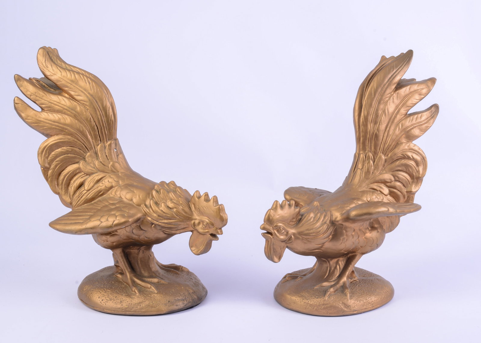 Pair of Alexander Backer Chalkware Roosters.: Height 13 inches.