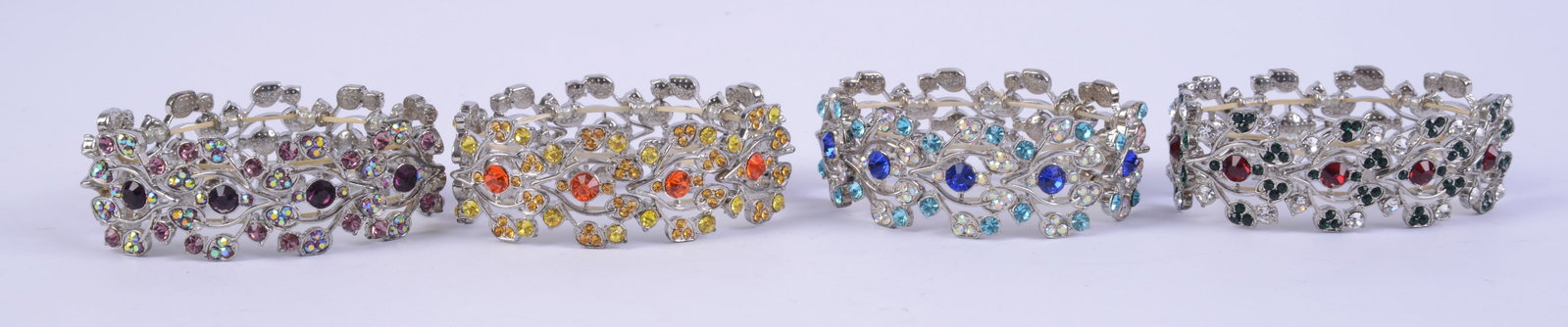 Four Danbury Mint Crystal Bracelets.: Diameter 2 inches, with elastic band.