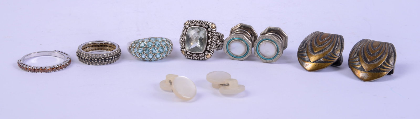 Four Sterling Rings and a Pair of Cufflinks.: Various stones.
