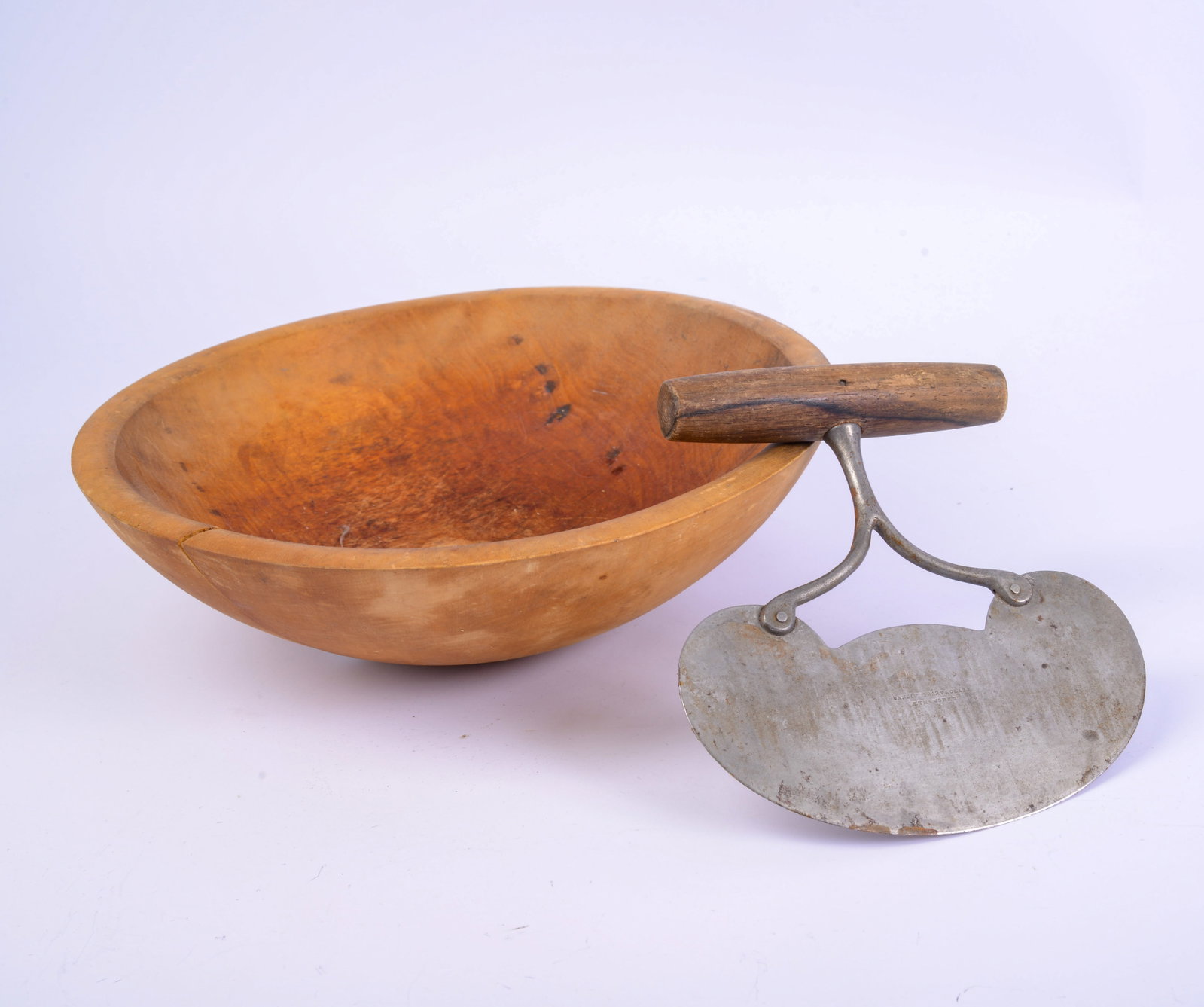 Wooden Bowl and a Chopper.: Bowl diameter 11.25 inches, chopper marked Landers, Frary & Clark.