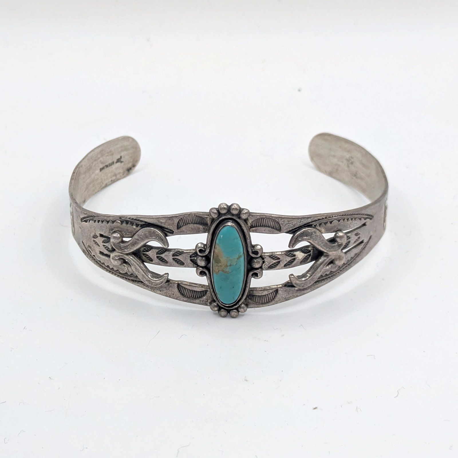 Native American Sterling and Turquoise Cuff Bracelet.: Diameter 2.25 inches.